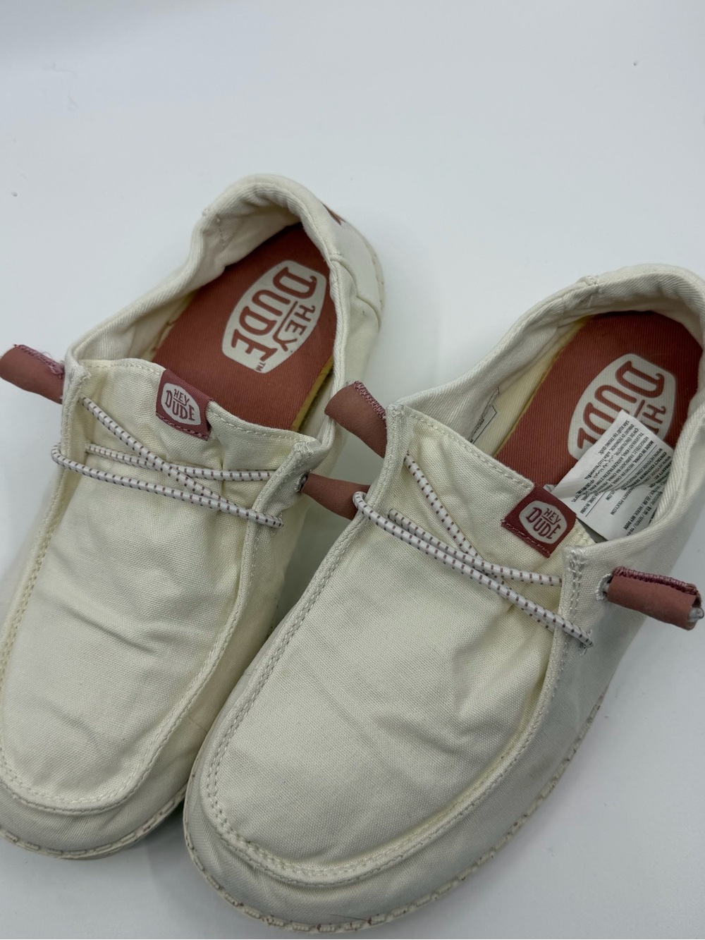 Hey Dude Men’s Off-White Canvas Slip-Ons with Mauve Accents